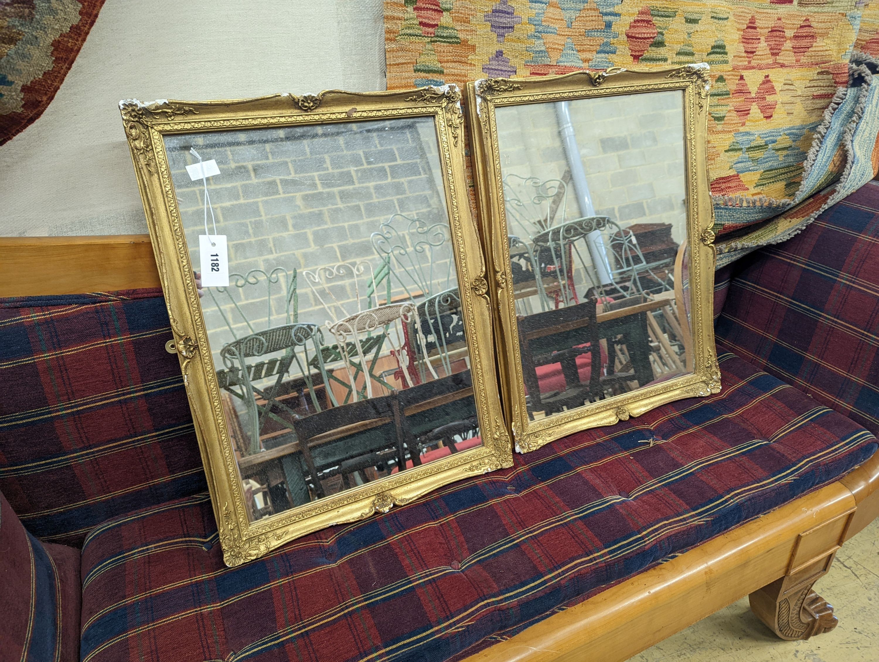 A pair of rectangular gilt gesso wall mirrors, width 48cm, height 64cm